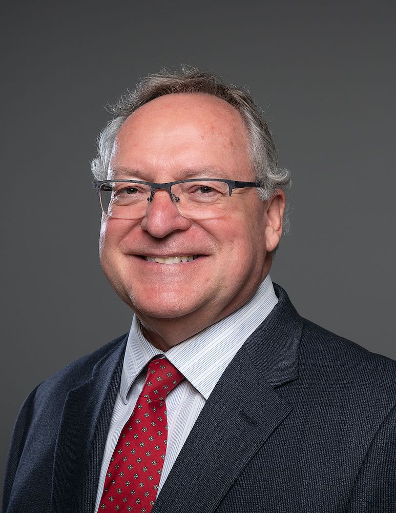 Headshot of Roger Gunn.
