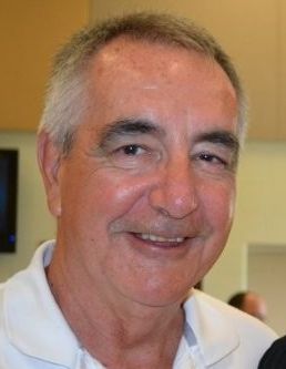 Headshot of David J. MacDonald.