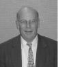 Headshot of David Starkman.
